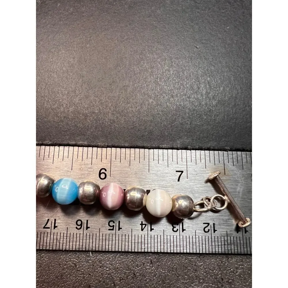 Vintage sterling silver and cats eye glass toggle bracelet